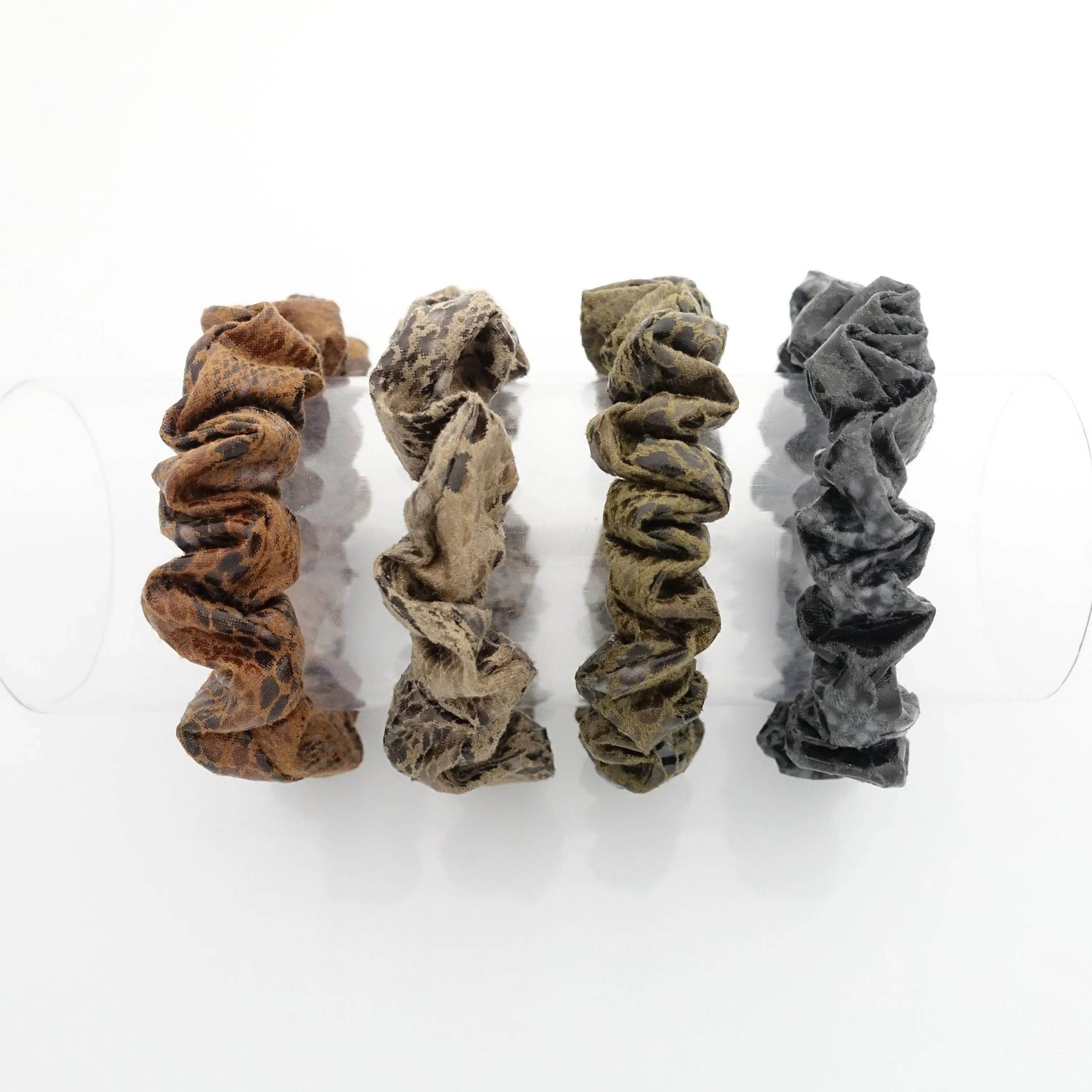 a set of 4 thin faux leather scrunchies stylish hair tie ponytail holder pack for women