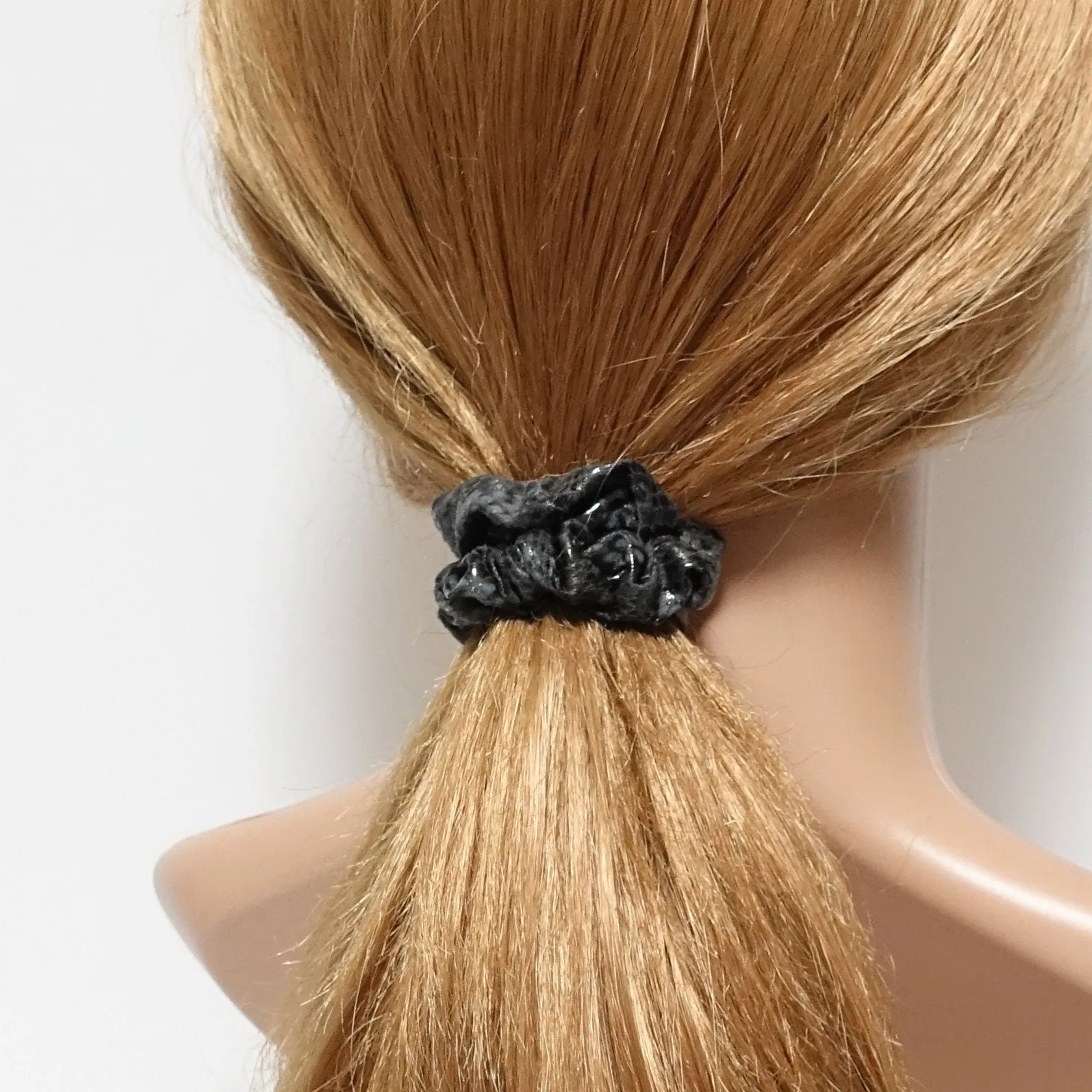 a set of 4 thin faux leather scrunchies stylish hair tie ponytail holder pack for women