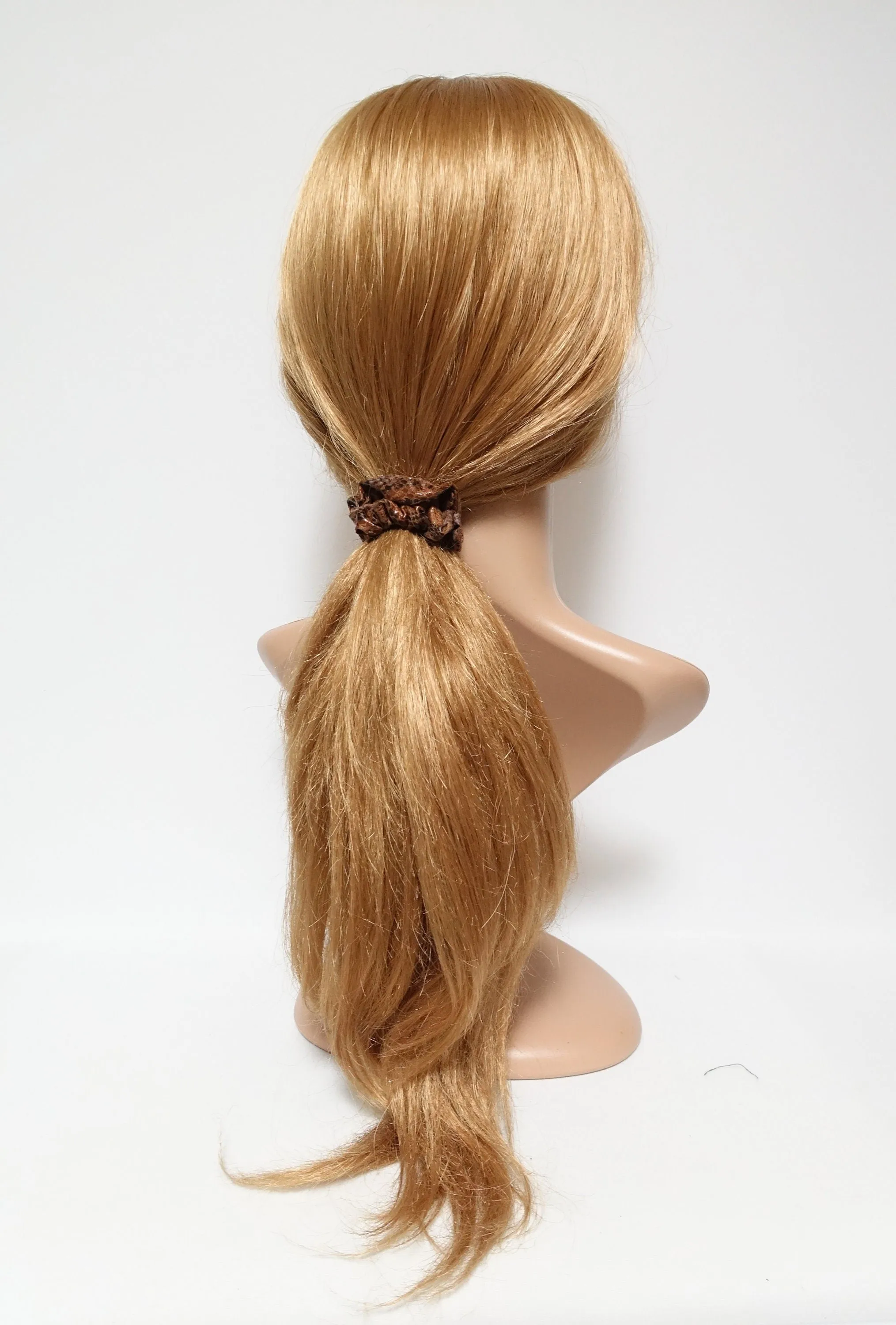 a set of 4 thin faux leather scrunchies stylish hair tie ponytail holder pack for women