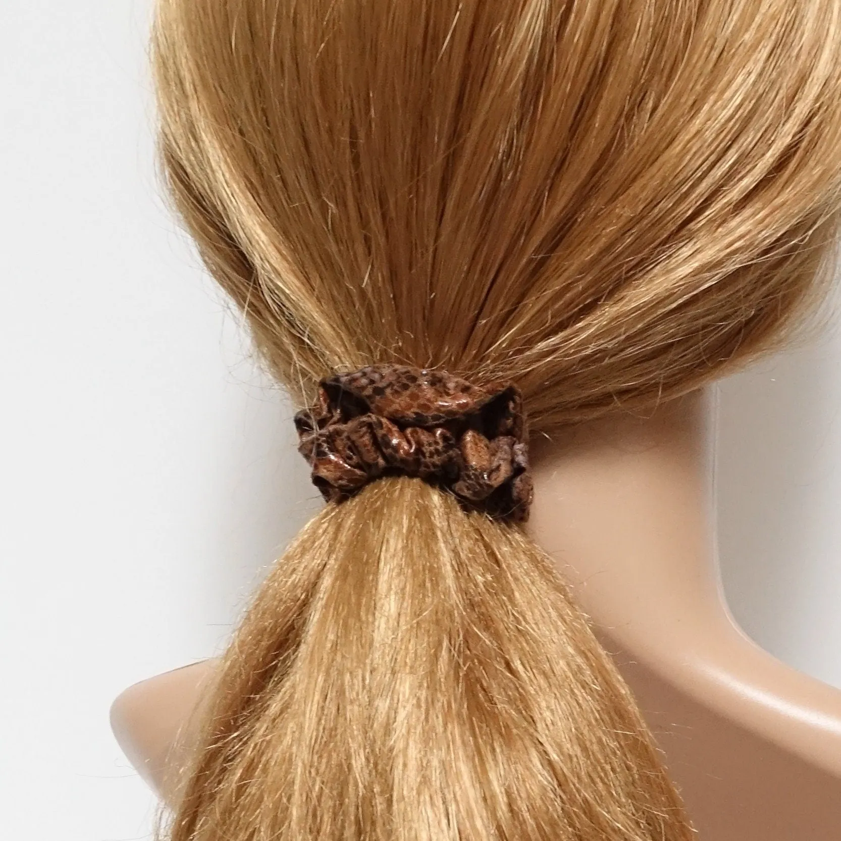 a set of 4 thin faux leather scrunchies stylish hair tie ponytail holder pack for women